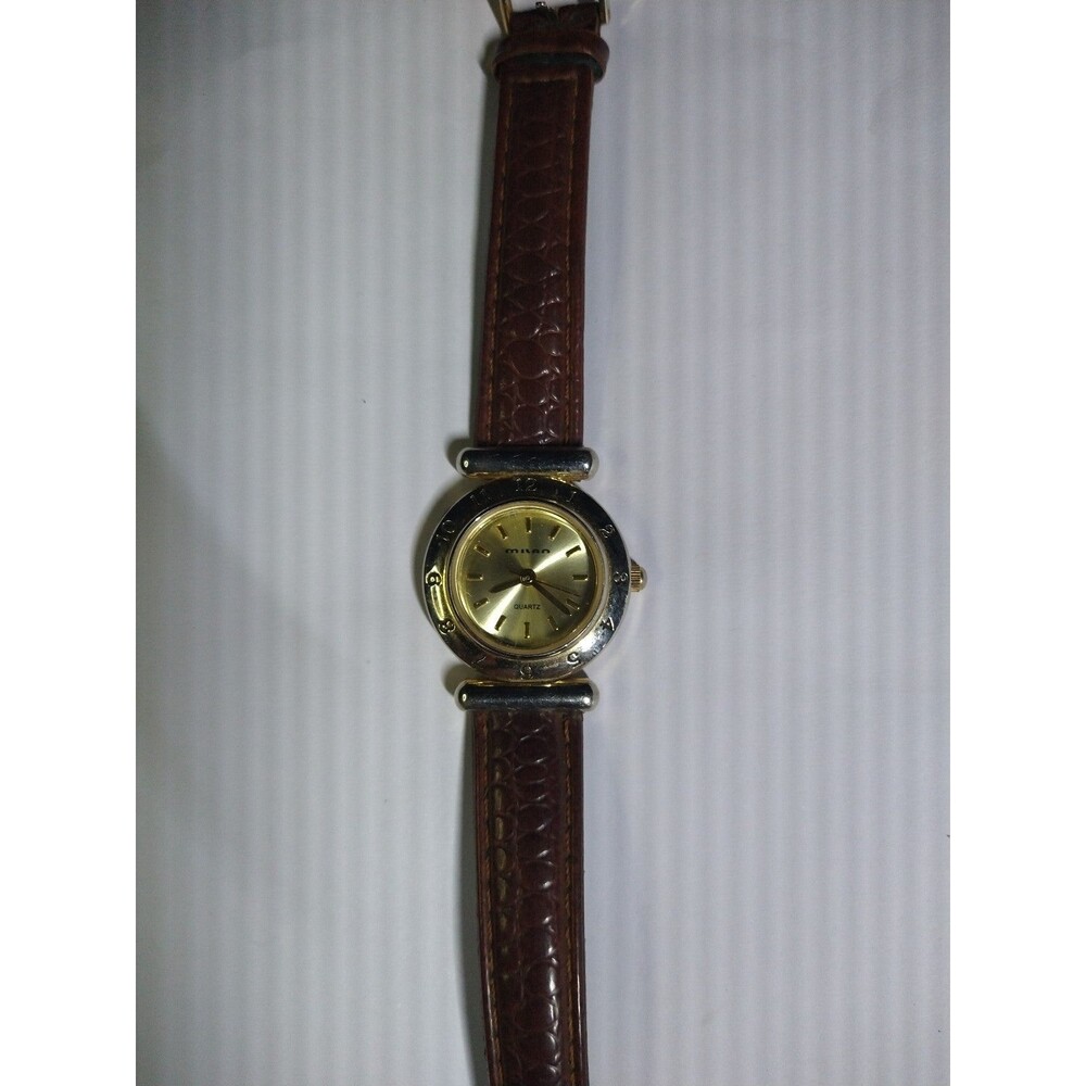 milano gold tone watch for women